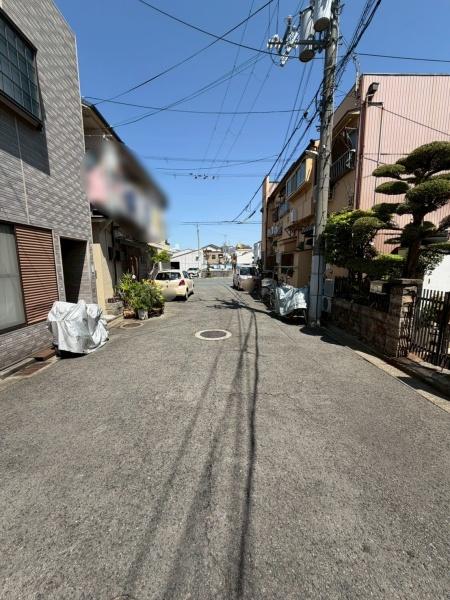 ���{�����s����1���ڂ̓y�n�̑O�ʓ��H�܂ތ��n�ʐ^