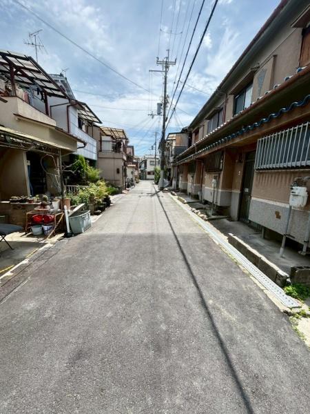 ���{�����s�ԉ�����2���ڂ̓y�n�̑O�ʓ��H�܂ތ��n�ʐ^