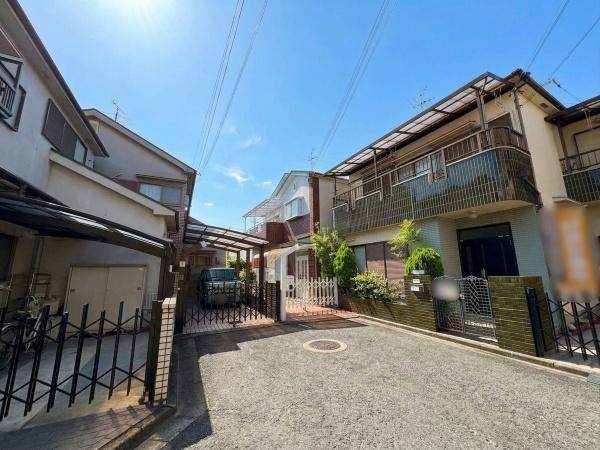 ���{�����s�����̒��È�ˌ��Ă̑O�ʓ��H�܂ތ��n�ʐ^