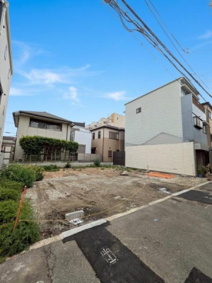 ���{���s����敽��{��5���ڂ̐V�z��ˌ��Ă̌��n�O�ώʐ^