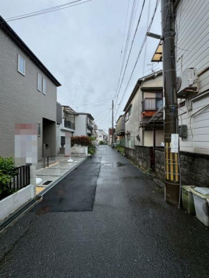 ���{�Q����s����7���ڂ̐V�z��ˌ��Ă̑O�ʓ��H�܂ތ��n�ʐ^