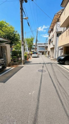 ���{���s����撆��6���ڂ̒��Ãe���X�n�E�X�̑O�ʓ��H�܂ތ��n�ʐ^