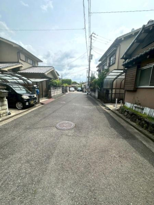 ���{���Îs���V�l��2���ڂ̒��È�ˌ��Ă̑O�ʓ��H�܂ތ��n�ʐ^